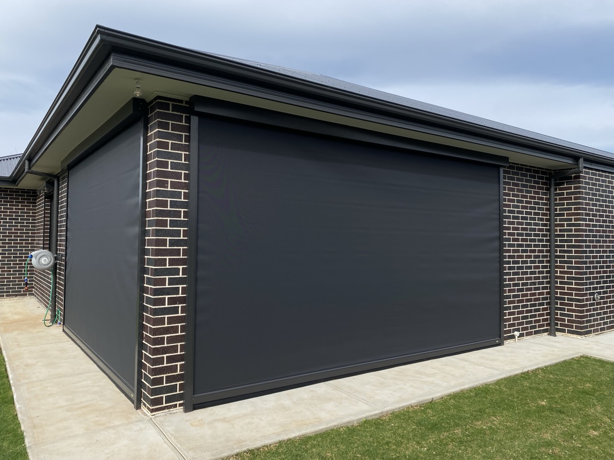 Dark outdoor blind close-up brick home