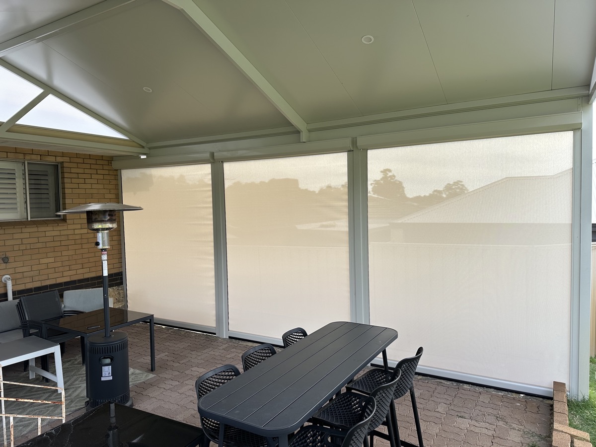 White outdoor blinds patio dining area